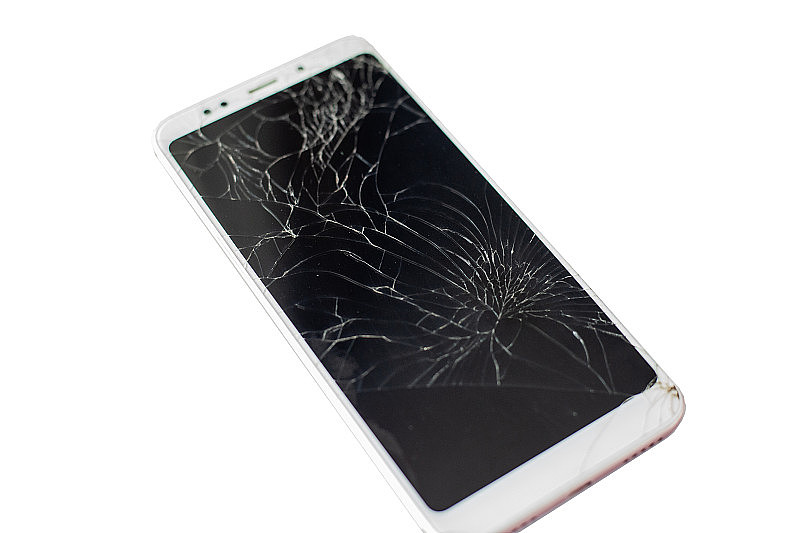 白色手机，传感器和屏幕破碎，触屏玻璃破碎，白色背景隔离