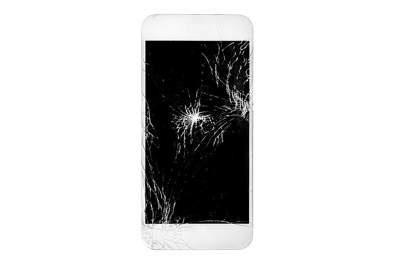 破碎的白色智能手机与破碎的屏幕隔离在白色背景