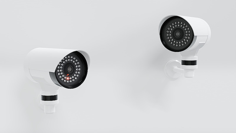白墙混凝土上的闭路电视摄像头安全系统。办公室安全监控摄像头，家中安全监控系统。3 d渲染。
