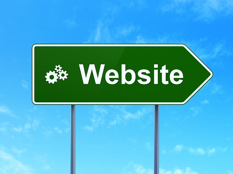 网站设计理念:网站和齿轮上的路标背景