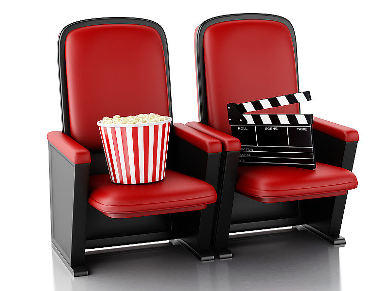 3d电影院拍板和爆米花在影院座位上。