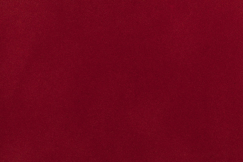 暗红色麂皮织物特写。天鹅绒质地。