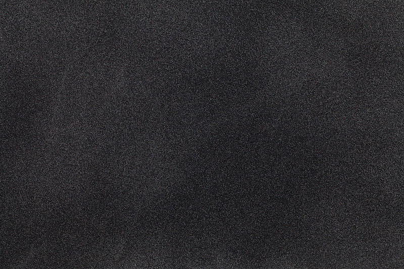 黑色麂皮织物特写。天鹅绒质地。