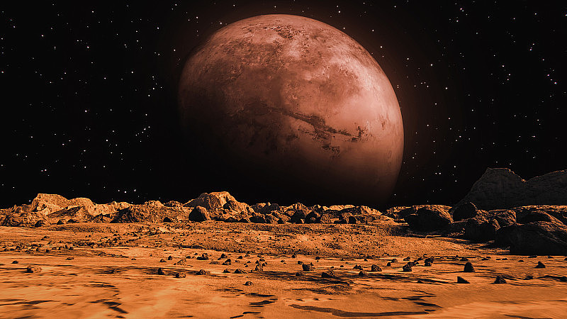从太空星球看火星。火星表面布满了小岩石和红色的沙子。火星景观在锈橙色阴影，火星行星表面，沙漠，悬崖，沙子。红色的火星。概念空间抽象背景。