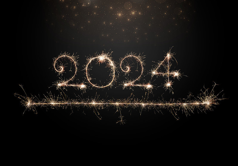 2024年新年快乐。燃烧闪闪发光的文字2024在黑色背景与发光粒子。漂亮的贺卡和节日传单。文字2024和下划线写的烟火为假日设计
