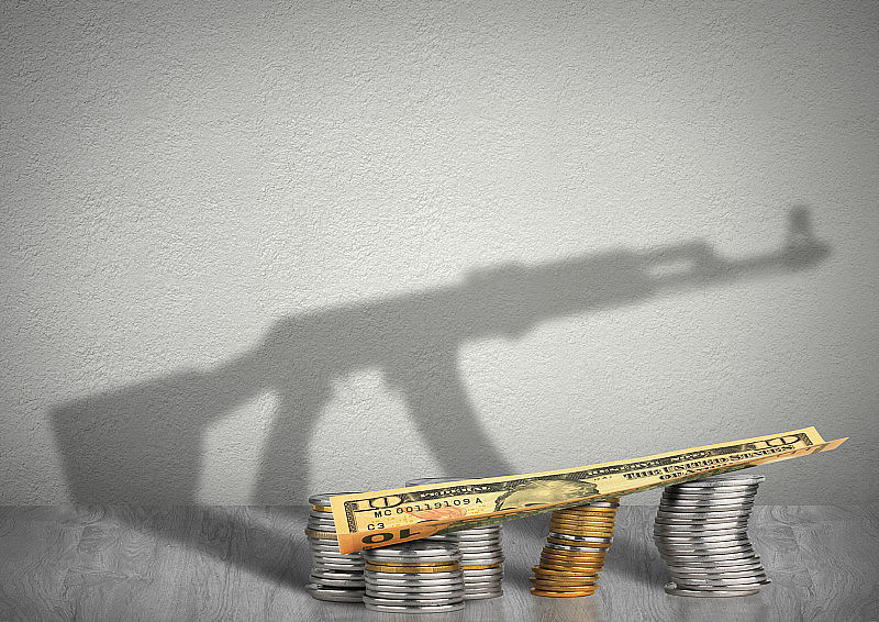 资助恐怖主义的概念，金钱与武器的影子
